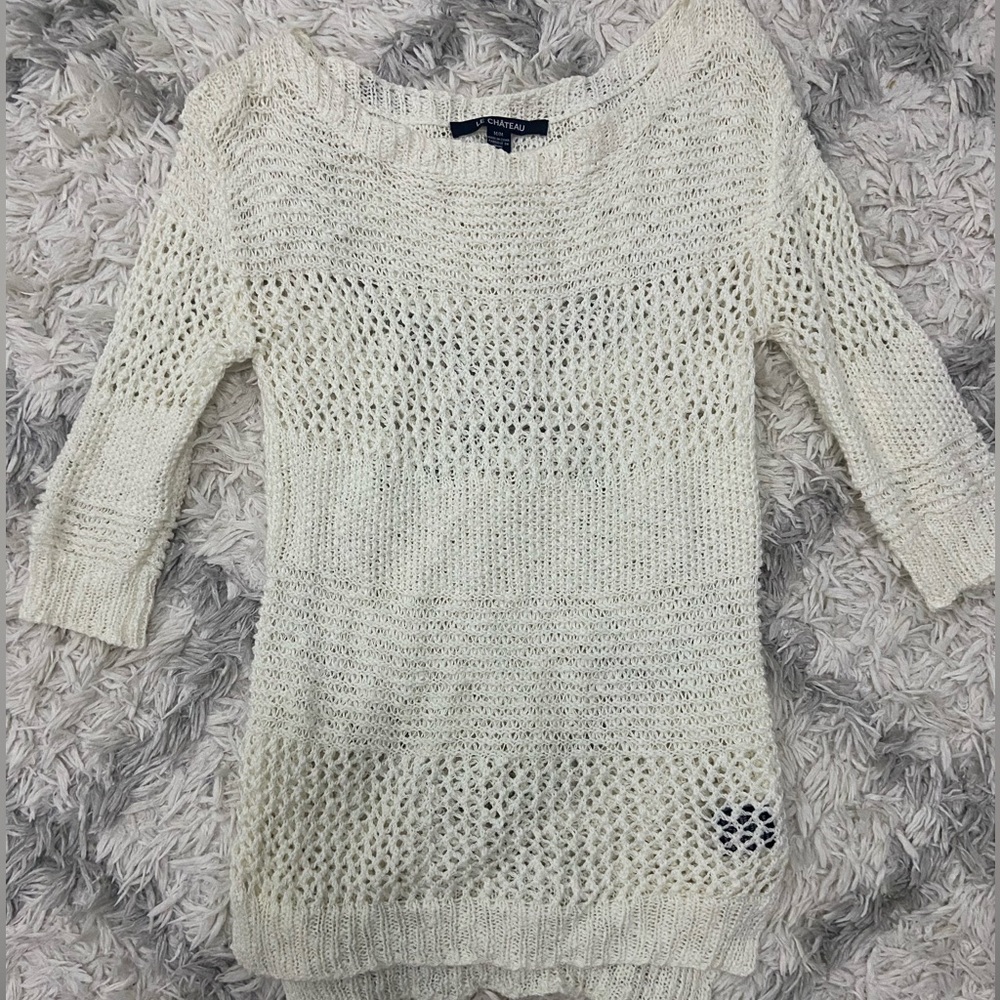 Le chateau open knit sweater. Medium